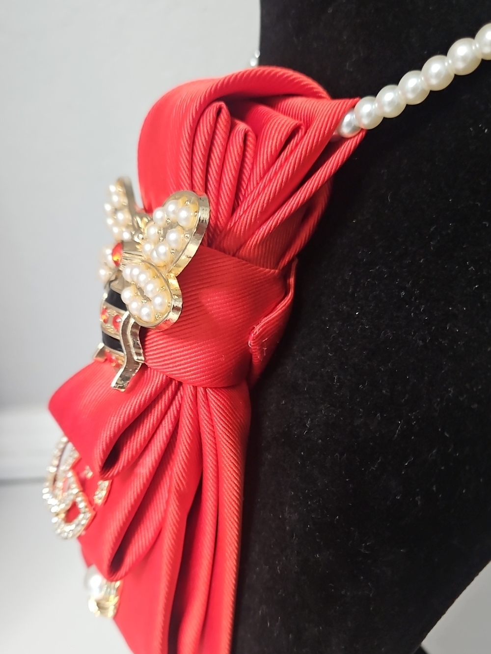 Upcycled Orange-Red Necktie Necklace with Gold Bee Brooch, GG and Pearl Accents - Picture 5 of 6